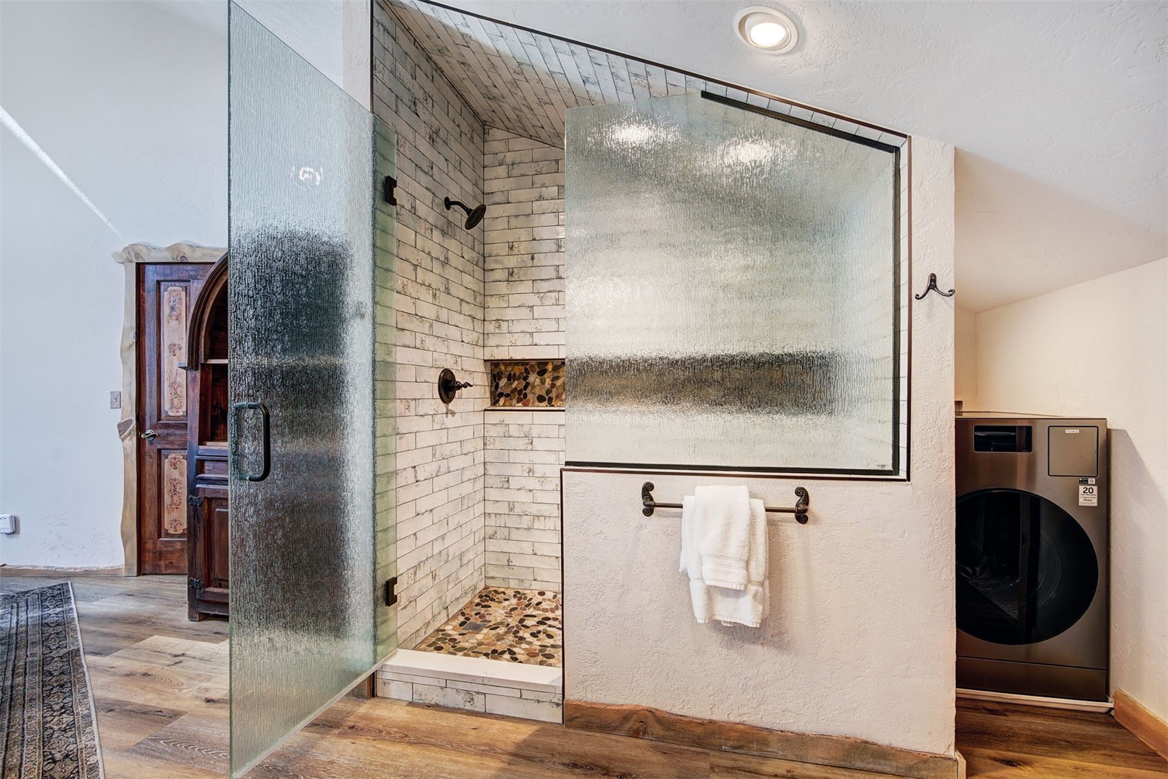 9460 Ryan Gulch Road, Unit 9460 Silverthorne, CO 80498 - Photo 14 of 39 a bathroom with a shower