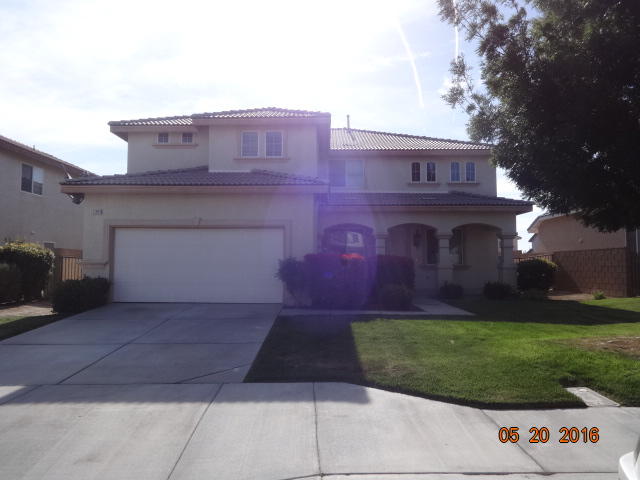 43660 Windrose Place Lancaster, CA 93536 - Photo 1 of 8 front view of a house with a yard