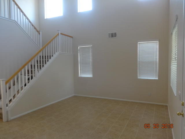 43660 Windrose Place Lancaster, CA 93536 - Photo 2 of 8 a view of room with stairs