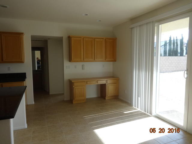 43660 Windrose Place Lancaster, CA 93536 - Photo 5 of 8 a view of a utility room with washer and dryer