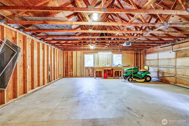 a view of a room with wooden walls
