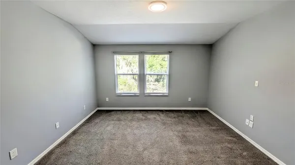 an empty room with an entryway