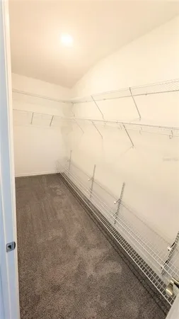 a bathroom with a double vanity sink and mirror