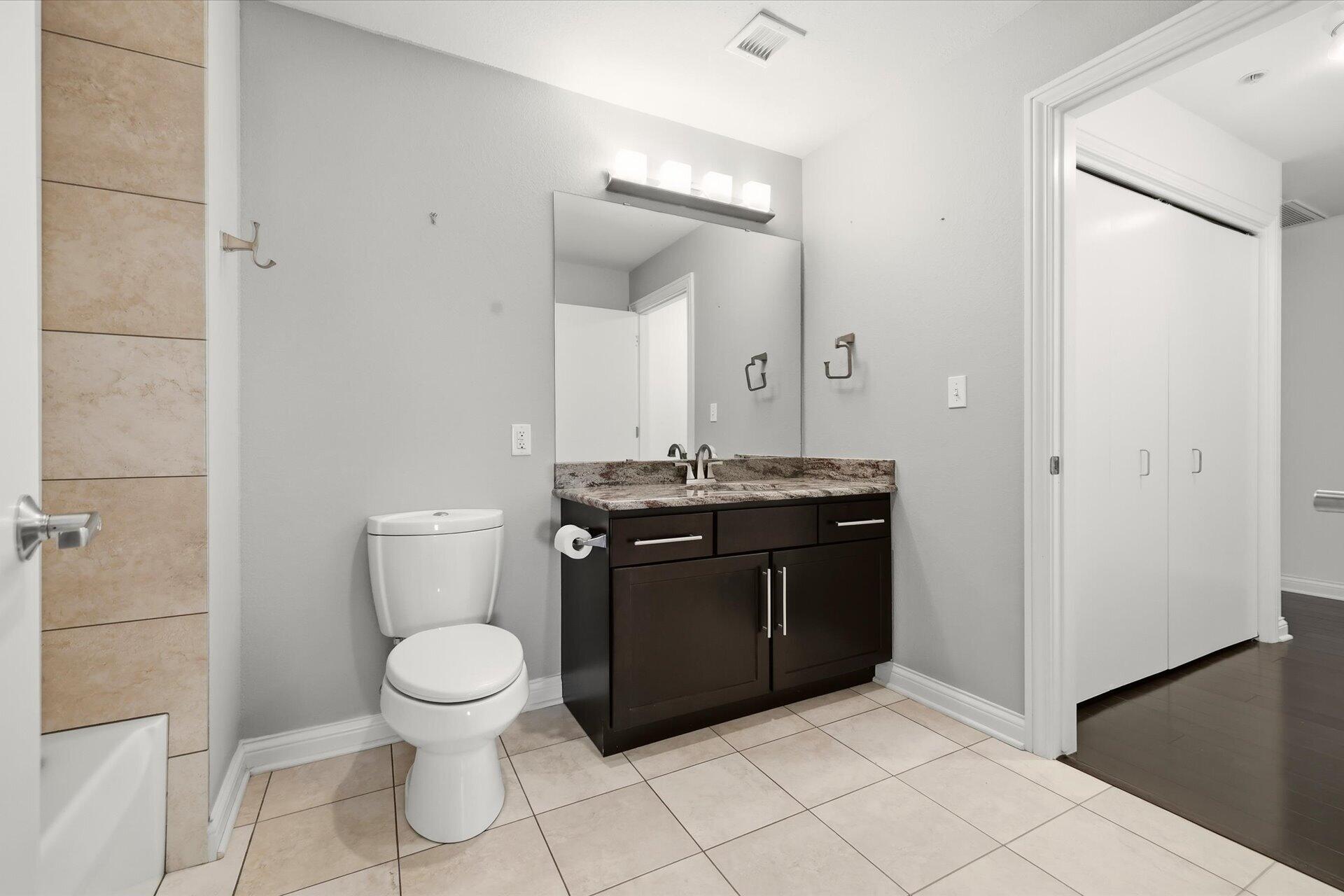 106 West Seeboth Street, Unit 920 Milwaukee, WI 53204 - Photo 32 of 51 Dual Entry- Granite counters, tile floor and shower