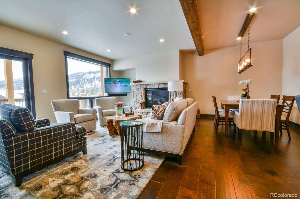 740 Independence Road, Unit 3C Keystone, CO 80435 - Photo 19 of 25 a living room with furniture and wooden floor