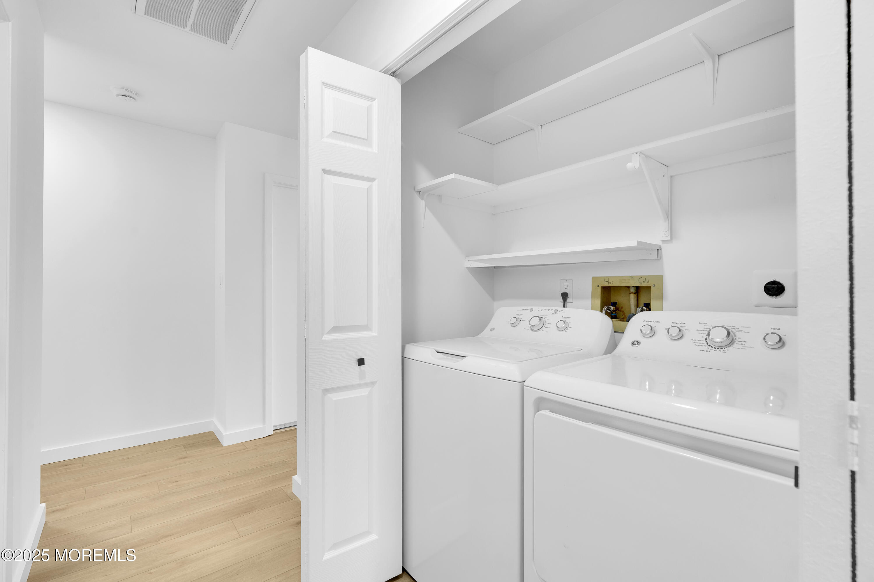 3 Tudor Court Brick, NJ 08723 - Photo 32 of 36 a utility room with dryer and washer