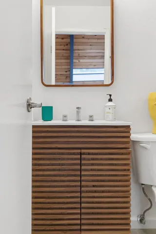 a bathroom with a sink and a toilet