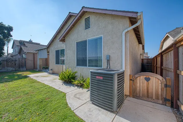 a house view with a garden space