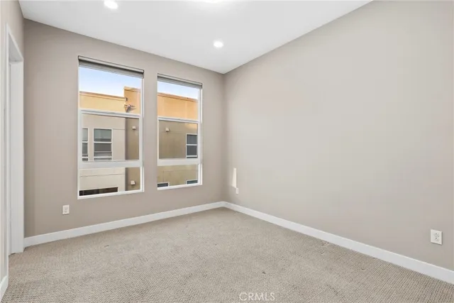 a view of a bathroom with a sink and mirror