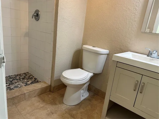 a view of a workspace with furniture