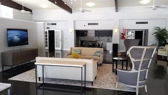 a view of a swimming pool with a yard