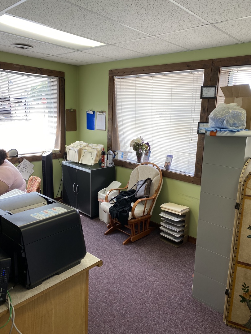 400 North Division Street Harvard, IL 60033 - Photo 6 of 13 a bedroom with a bed and a window