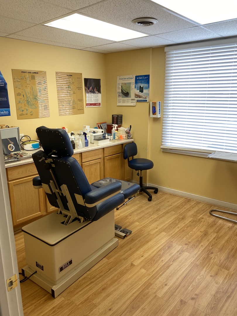400 North Division Street Harvard, IL 60033 - Photo 9 of 13 a living room with furniture and a flat screen tv