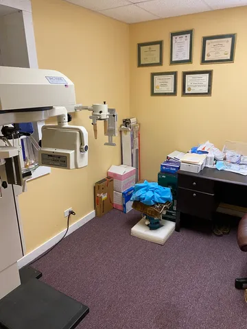 a room with furniture and gym equipment