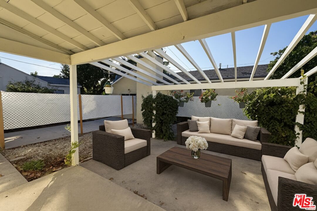 7465 North Forbes Ave Lake Lake Balboa, CA 91406 - Photo 11 of 13 a outdoor living space with patio furniture