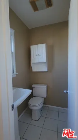 a bathroom with a toilet