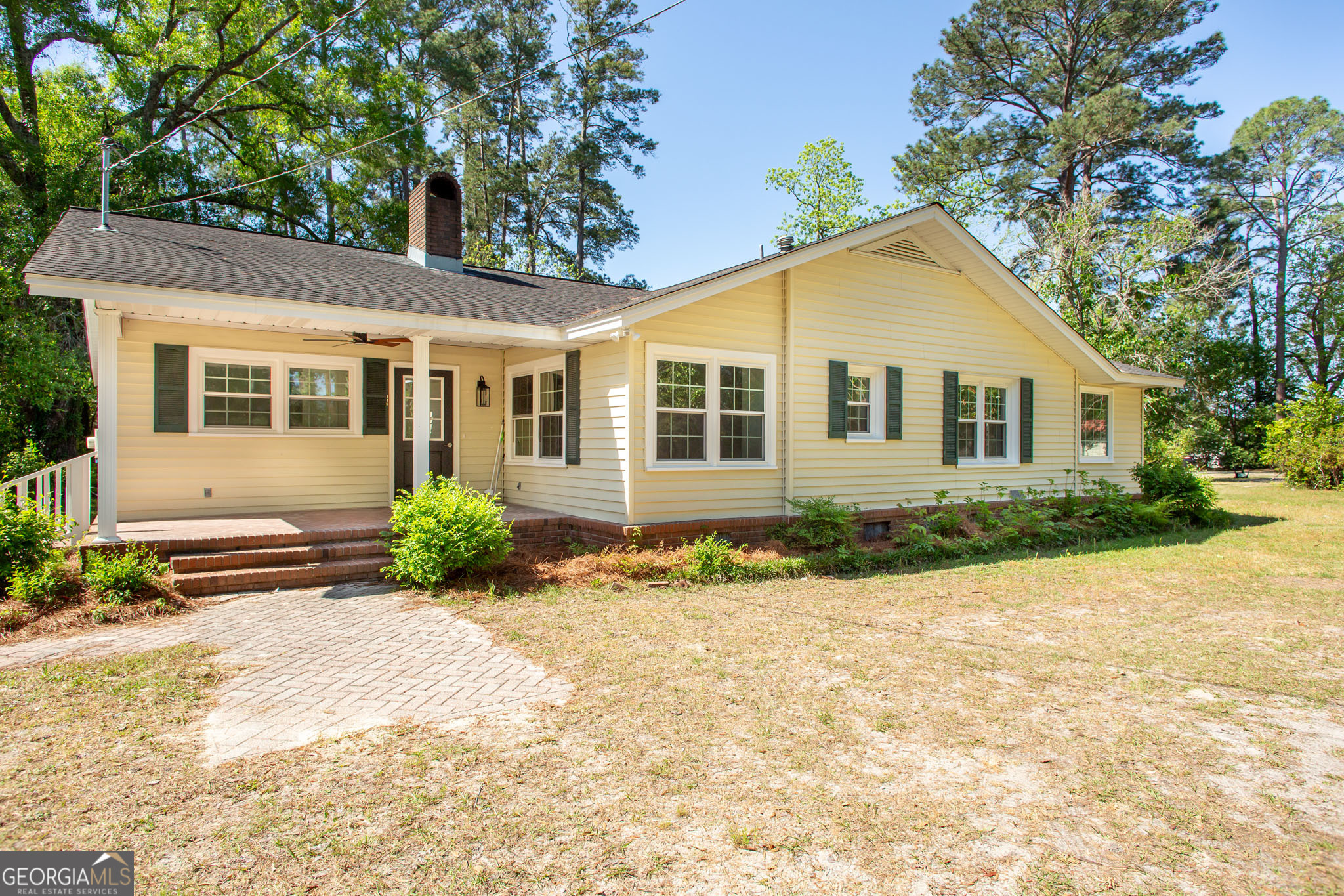 110 Briarwood Road Waycross, GA 31501 - Photo 2 of 35 a front view of a house with a yard
