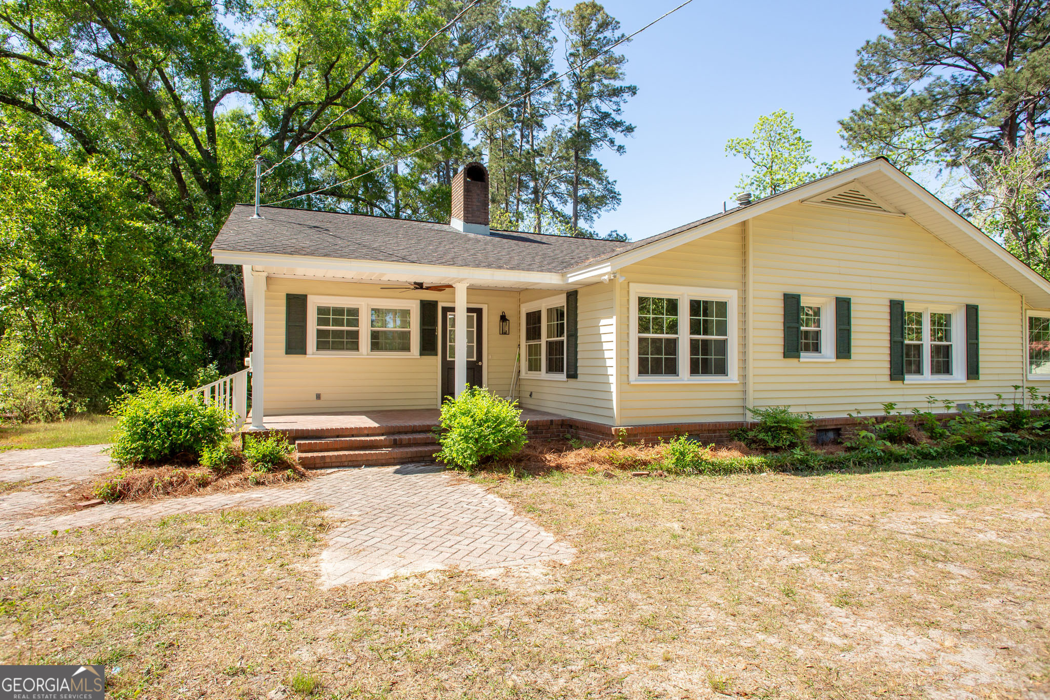 110 Briarwood Road Waycross, GA 31501 - Photo 3 of 35 a front view of a house with a yard