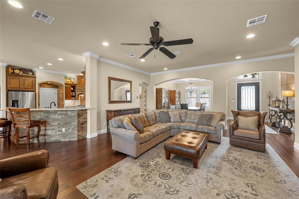 14690 Chapel Road Lorena, TX 76655 - Photo 3 of 40 a living room with furniture and a wooden floor