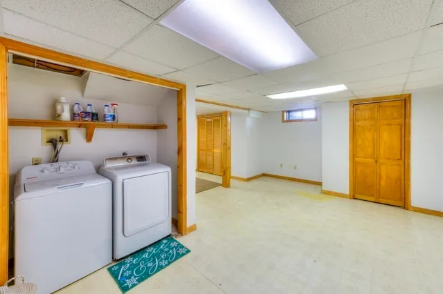 a view of storage and utility room with a washer and dryer