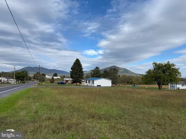 a view of a golf course with a lake