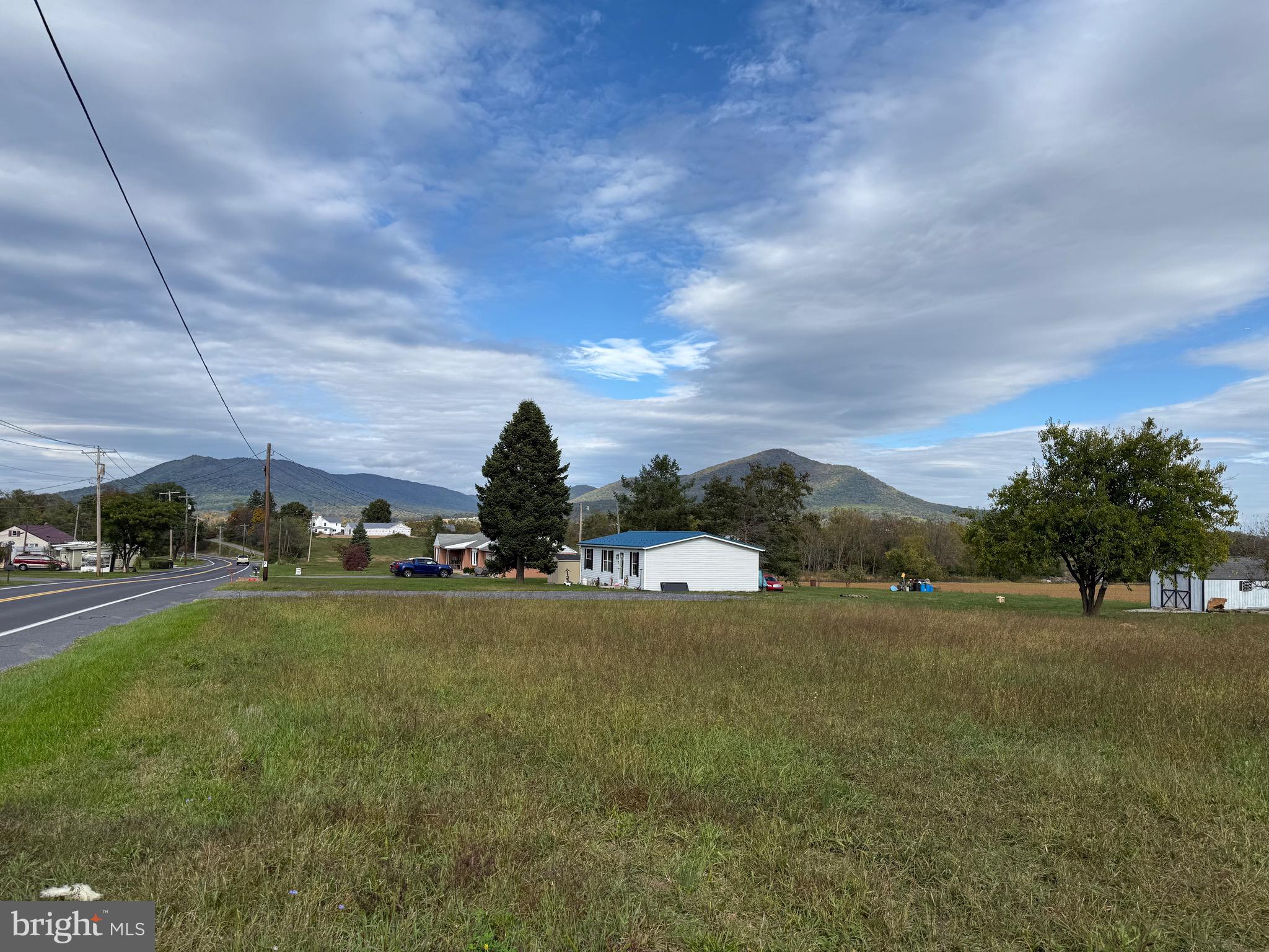 2174 Fort Loudon Road Mercersburg, PA 17236 - Photo 3 of 14 a view of a golf course with a lake