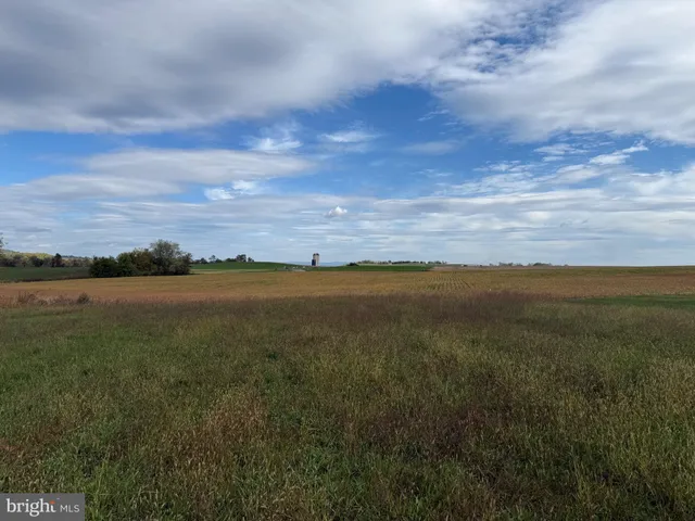 a view of an ocean and mountain