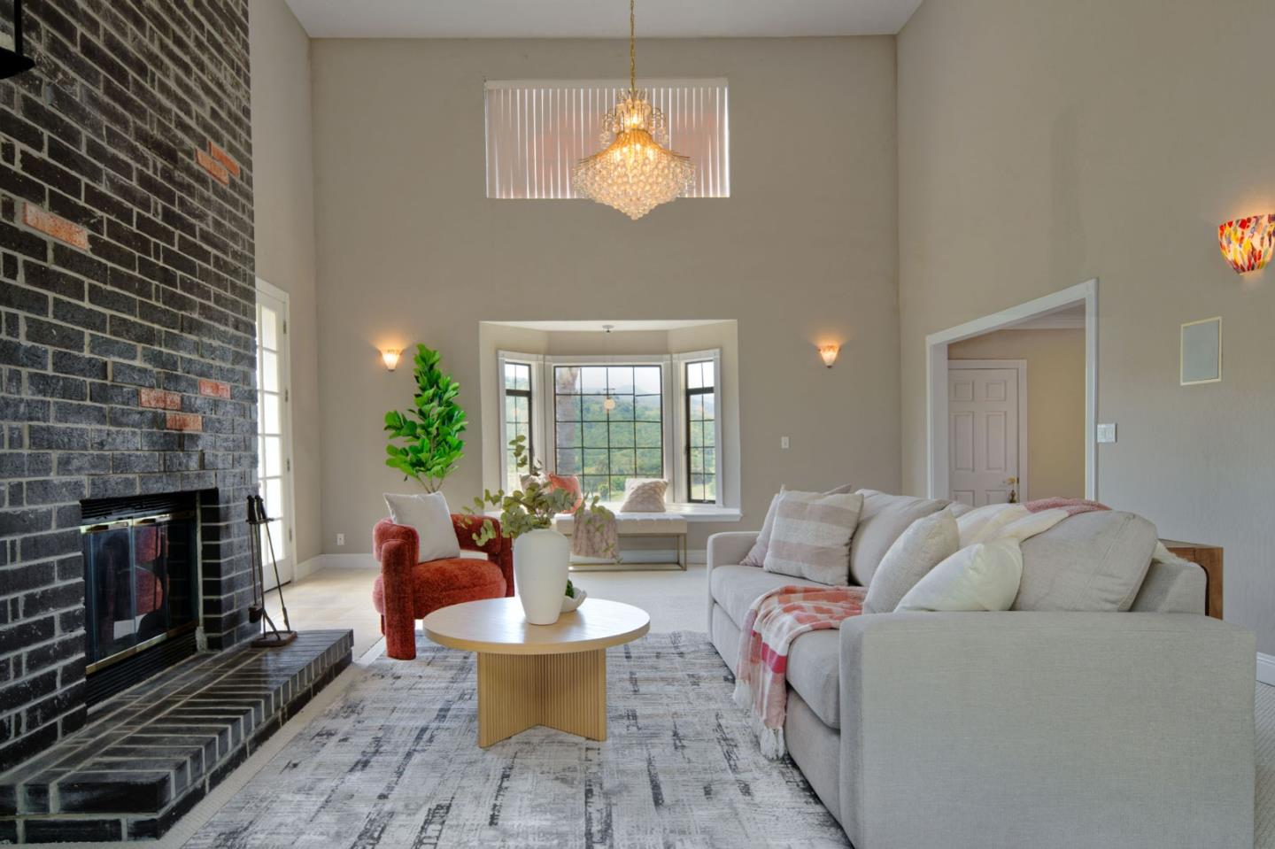 7790 Lost View Road San Jose, CA 95120 - Photo 12 of 48 a living room with furniture a fireplace and a chandelier