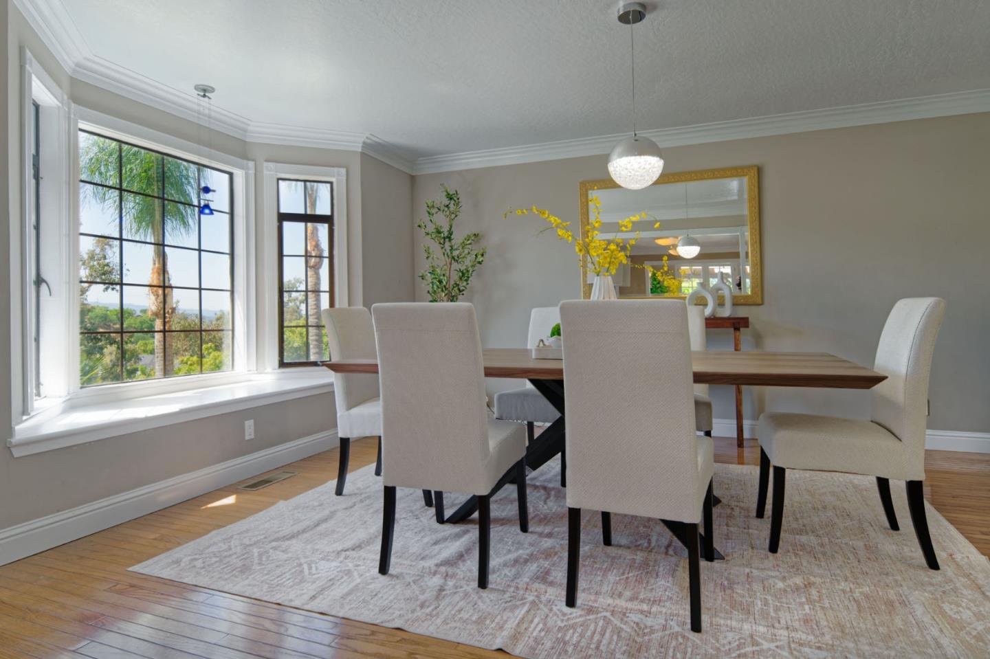 7790 Lost View Road San Jose, CA 95120 - Photo 14 of 48 a view of a dining room with furniture window and wooden floor
