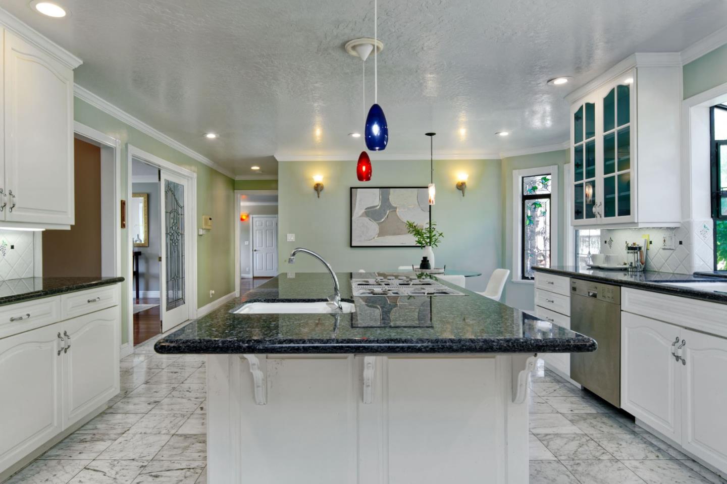 7790 Lost View Road San Jose, CA 95120 - Photo 20 of 48 a bathroom with a granite countertop sink a mirror and shower