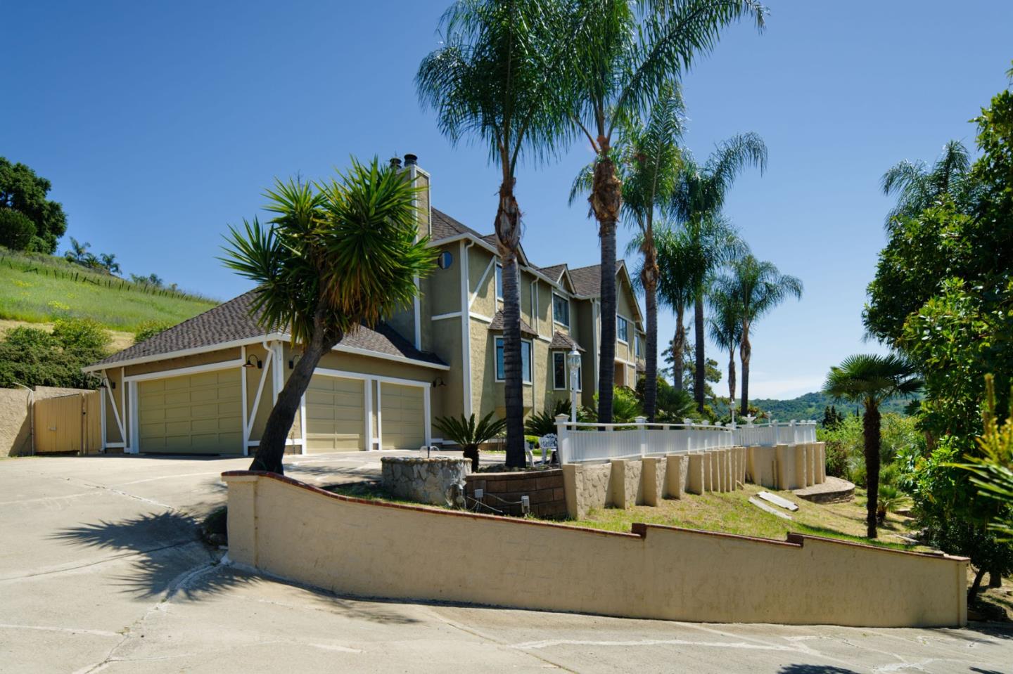7790 Lost View Road San Jose, CA 95120 - Photo 2 of 48 a view of a house with a swimming pool and a chair