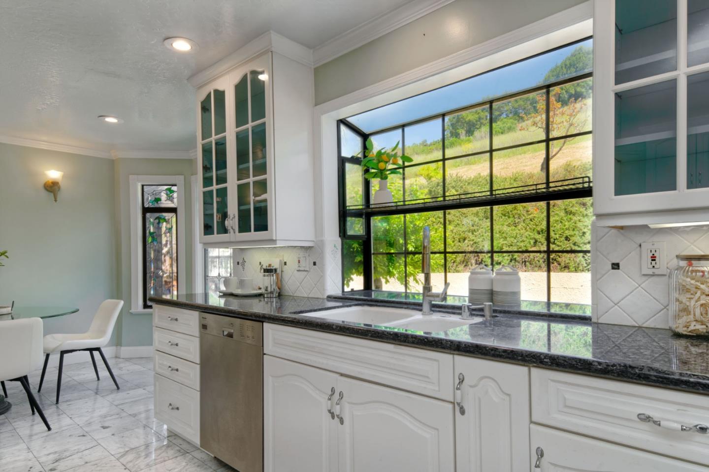 7790 Lost View Road San Jose, CA 95120 - Photo 21 of 48 a kitchen with granite countertop a sink and a window