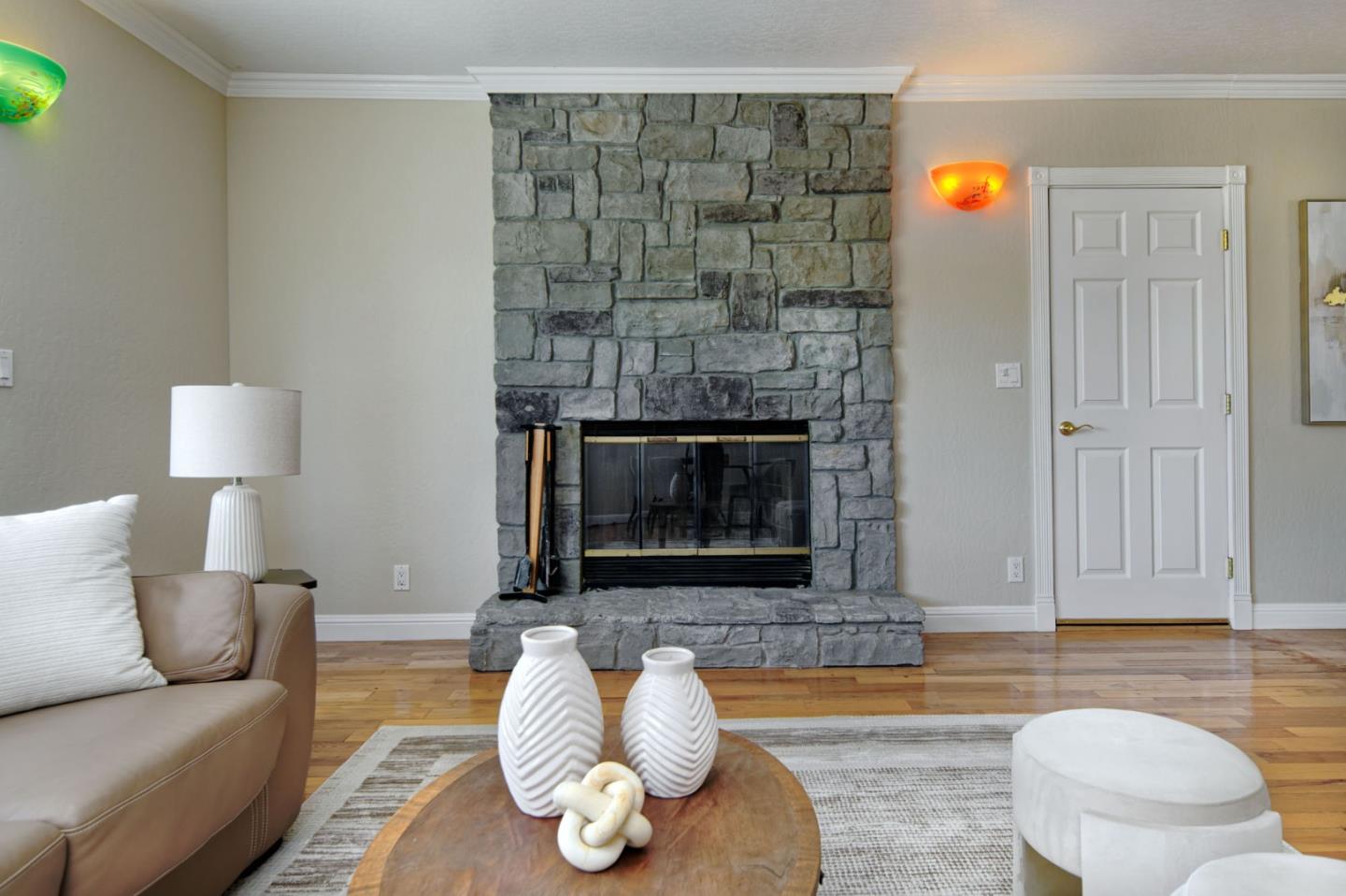 7790 Lost View Road San Jose, CA 95120 - Photo 23 of 48 a living room with furniture and a fireplace