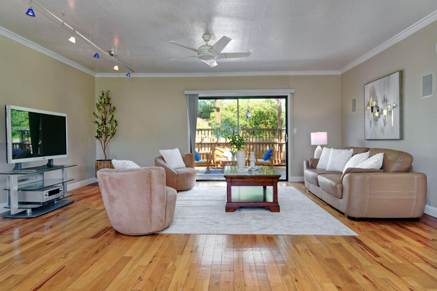 7790 Lost View Road San Jose, CA 95120 - Photo 24 of 48 a living room with furniture and a flat screen tv