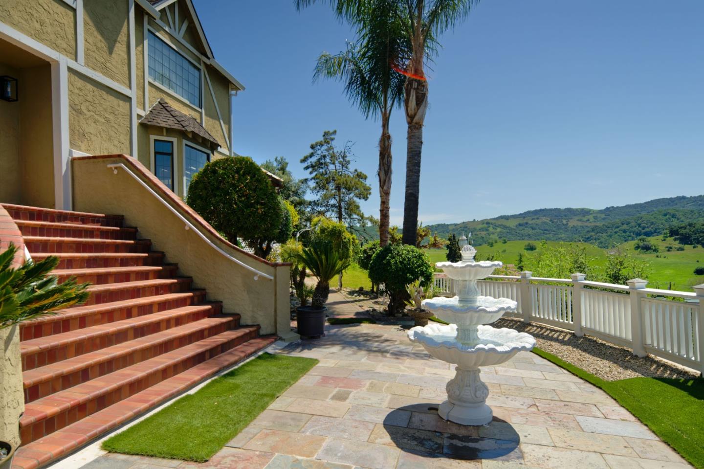 7790 Lost View Road San Jose, CA 95120 - Photo 3 of 48 a view of a chair and tables in the balcony with potted plants