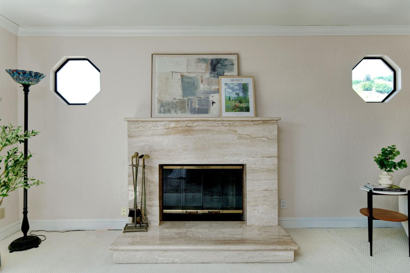 7790 Lost View Road San Jose, CA 95120 - Photo 31 of 48 a living room with a fireplace and a potted plant
