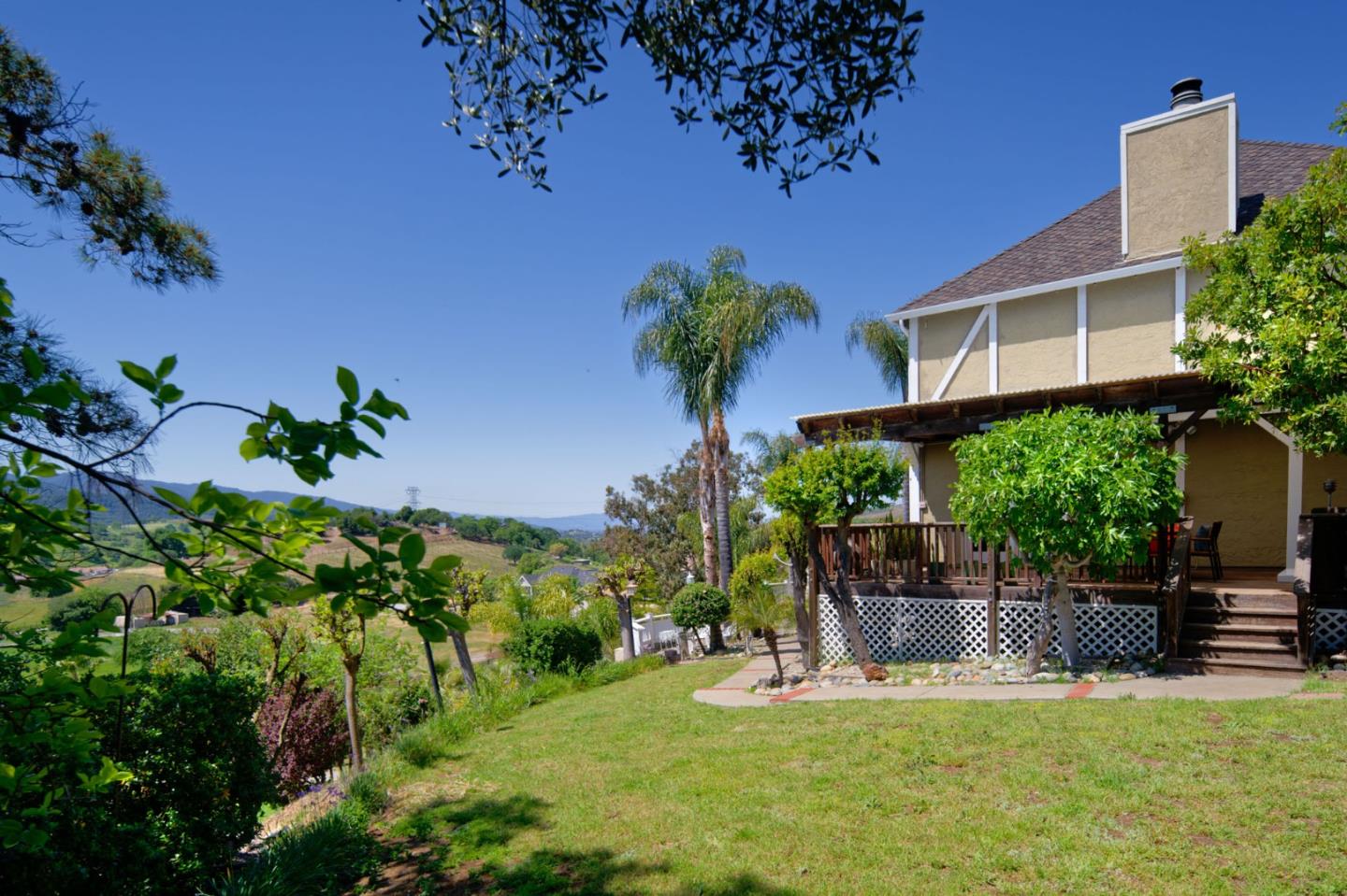 7790 Lost View Road San Jose, CA 95120 - Photo 42 of 48 a view of a backyard with plants and a patio