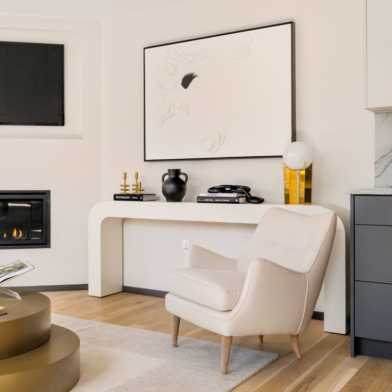 29-31 Highland Road, Unit 29 Brookline, MA 02445 - Photo 15 of 39 a bedroom with a bed and a flat screen tv