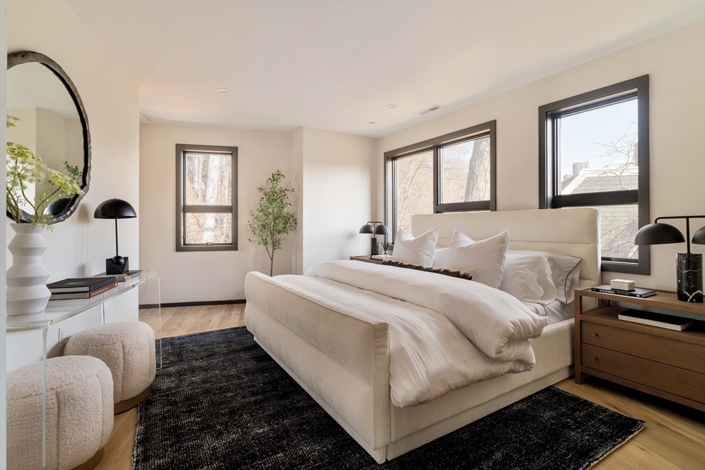 29-31 Highland Road, Unit 29 Brookline, MA 02445 - Photo 35 of 39 a bedroom with bed and window