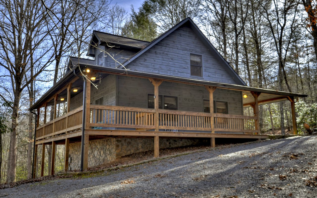264 Sawmill Circle Blue Ridge, GA 30513 - Photo 1 of 39 a view of a house with a window and wooden fence