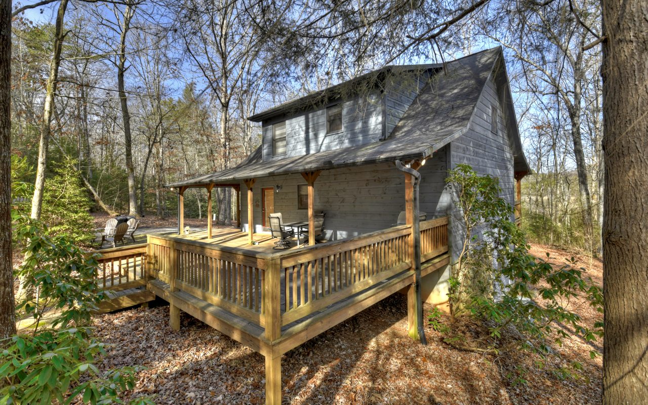 264 Sawmill Circle Blue Ridge, GA 30513 - Photo 28 of 39 a view of a house with backyard and sitting area
