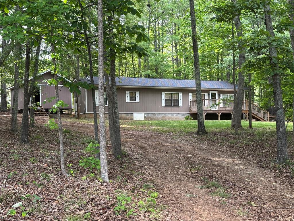 710 Spiva Road Temple, GA 30179 - Photo 2 of 31 a front view of a house with garden