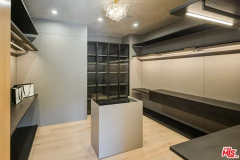 a view of a refrigerator and window in a room