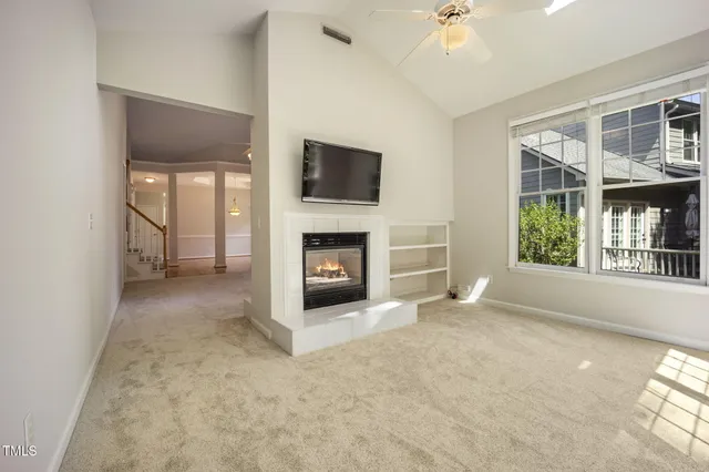 a kitchen with a stove top oven sink and cabinets