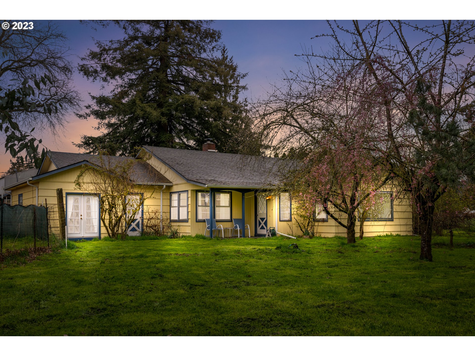 15200 Northwest Gillihan Road Portland, OR 97231 - Photo 1 of 42 a front view of house with yard and green space