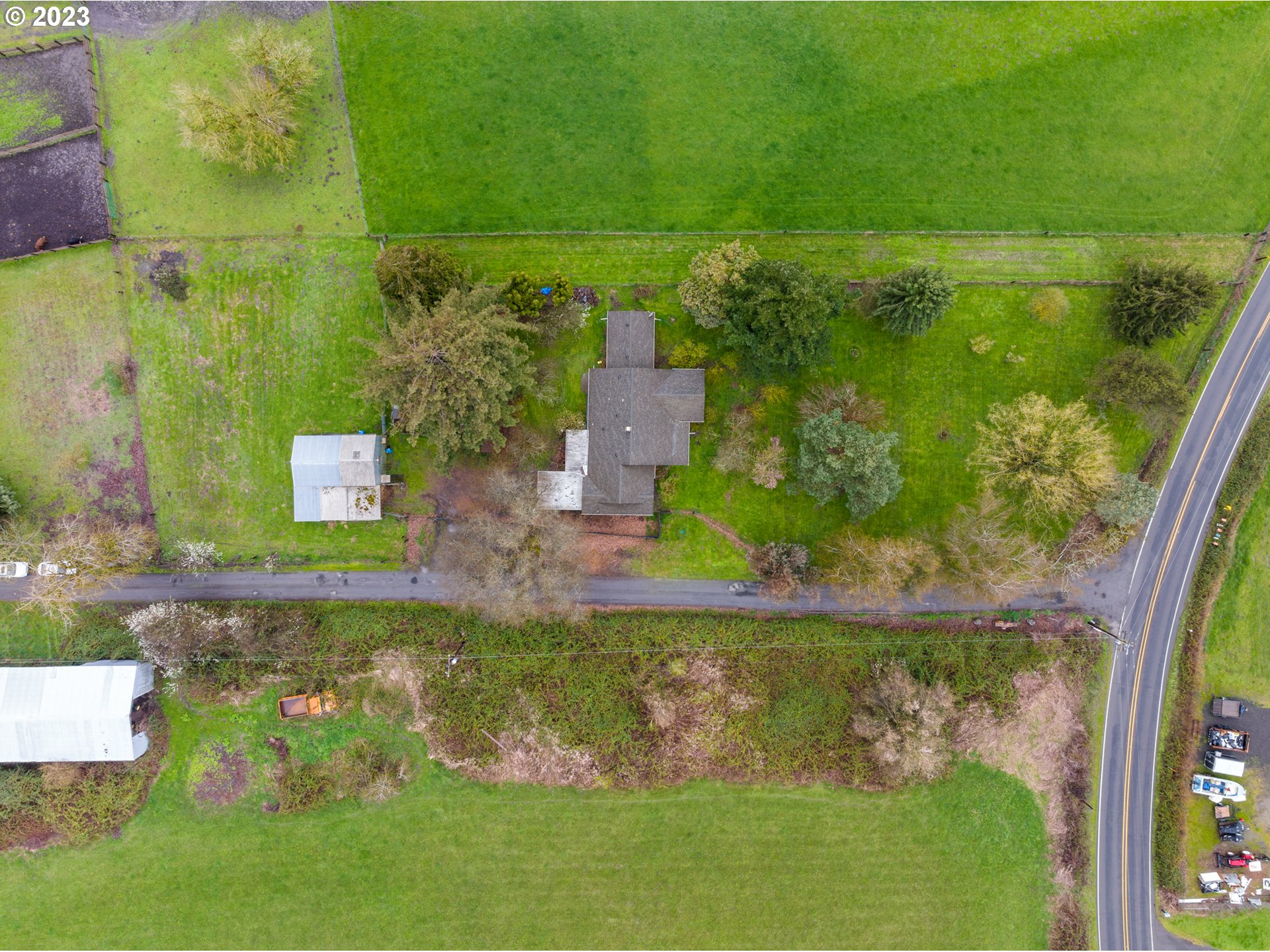 15200 Northwest Gillihan Road Portland, OR 97231 - Photo 42 of 42 an aerial view of a house with a yard