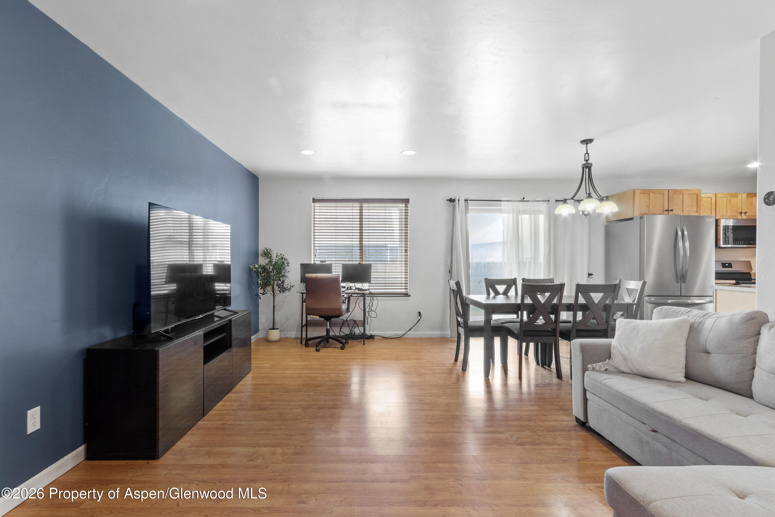 837 East 17th Street Rifle, CO 81650 - Photo 6 of 21 a view of a dining room with furniture window and outside view