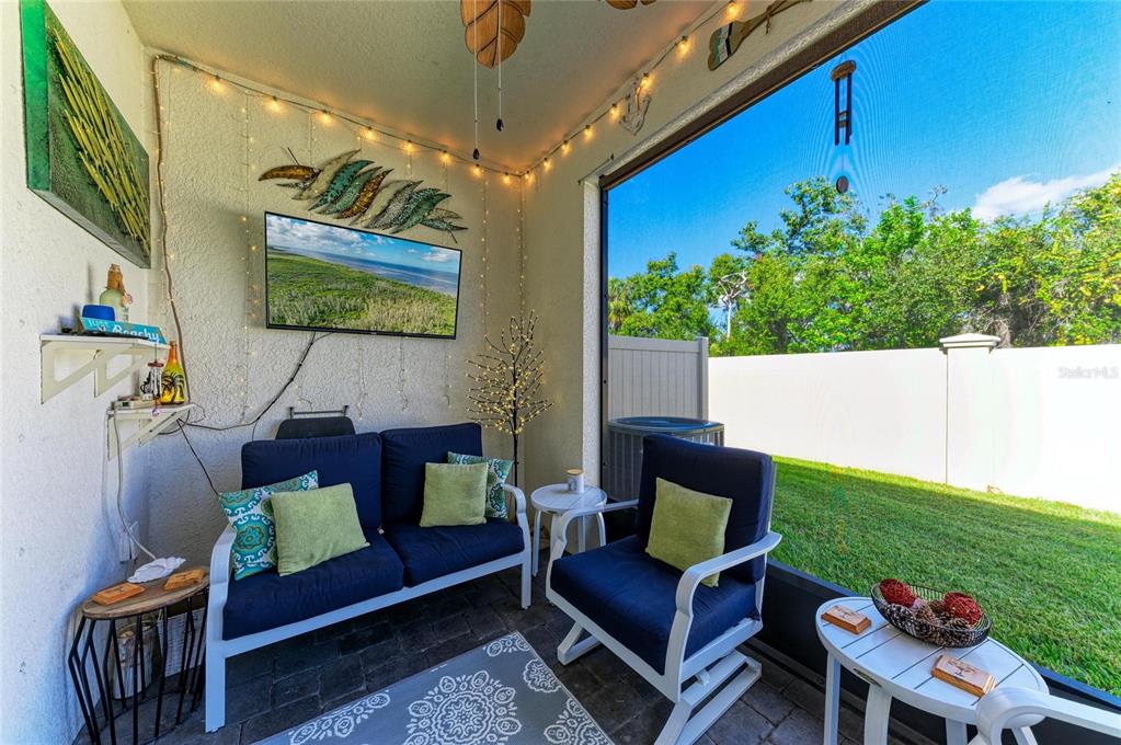 11637 Woodleaf Drive Lakewood Ranch, FL 34211 - Photo 34 of 54 a building outdoor space with patio furniture