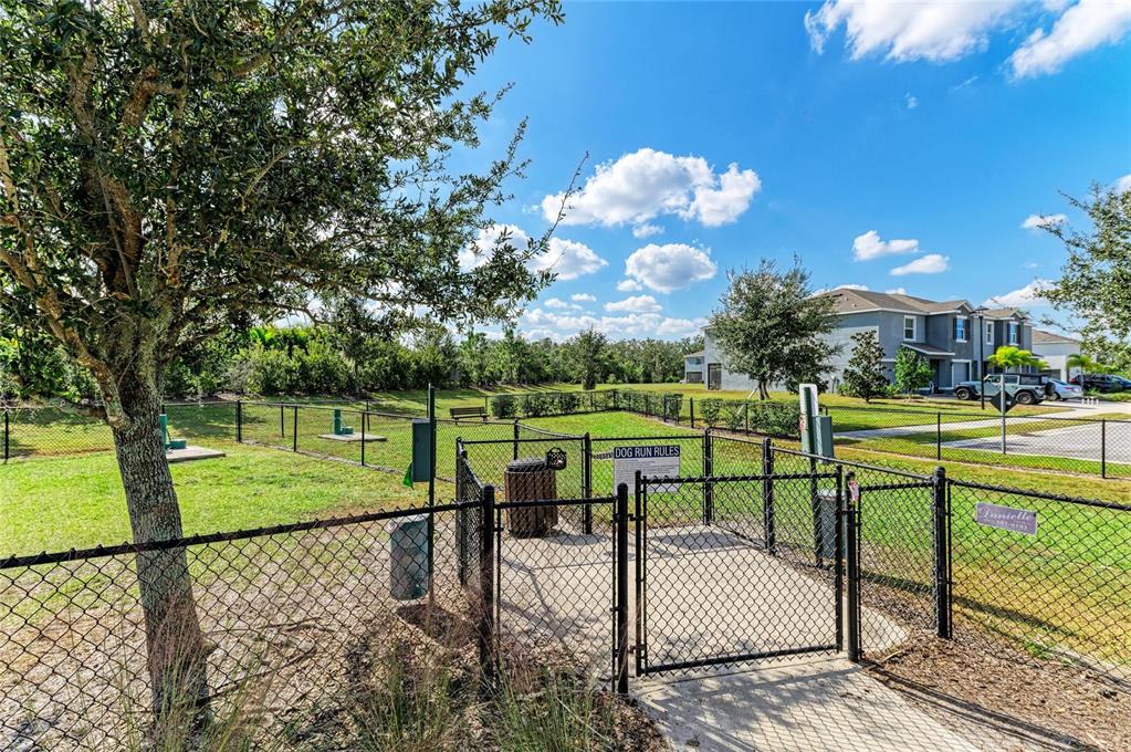 11637 Woodleaf Drive Lakewood Ranch, FL 34211 - Photo 47 of 54 a view of a park with large trees