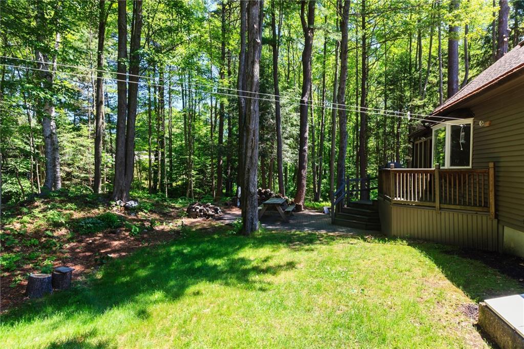 27 Cheverus Road Cape Elizabeth, ME 04107 - Photo 27 of 31 The wooded back yard gives the...